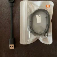 کابل شارژ و بند مچ بند شیائومی Mi Band 2 رایگان