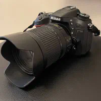 دوربین نیکون D7100 + لنز VR 140-18 در حد نو فول پک