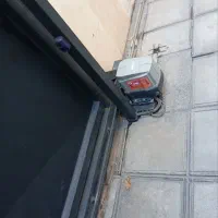 تعمیر و نصب انواع درب های اتوماتیک و دوربین وکرکره
