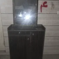 جاکفشی  با اینه
