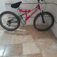 دوچرخه  دو کمک
