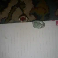 یک نگین تراش نداده فیروزه نیشابور ویک انگشتر زنانه