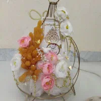 شاخه نبات و گل مصنوعی