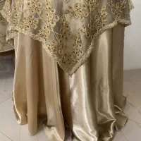 رومیزی ملیله دوزی و میز گرد چوبی