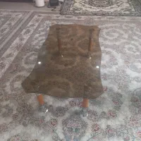 میز وسط شیشه ای درحد ....یه جفت بلندگو پژو