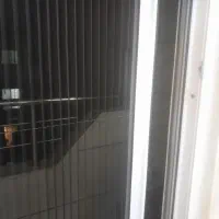 نصب توری پشه بندی درب پنجره ساختمان