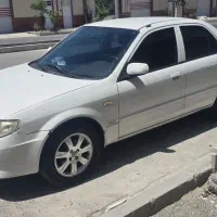 مزدا۳۲۳ اتوماتیک سفید بدون رنگ