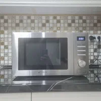 ماکروویو اسنوا FM32GCS آکبند