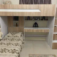 تخت دو طبقه به همراه میز تحریر کشو
