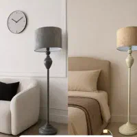 آباژور ایستاده کنار سالنی رنگ مشکی و طوسی کرم