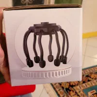 ماساژور سر (نو) (قیمت توافقی به علت مهاجرت)