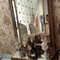 آیینه وکنسول وشمعدان وساعت