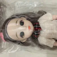 عروسک مفصلی چشم تیله ای