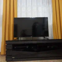 میز تلویزیون باز شو دوتیکه با قابلیت تنظیم در فضا