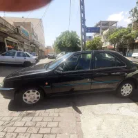 باسلام یک‌ماشین پژوپارس‌مشکی‌درحده‌نو