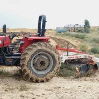 کار با تراکتور درمزارع شالیزارها ی شمال