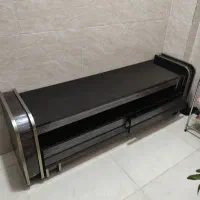 میز وسط جلو مبلی شیشه ای طرح چوب براق شیک