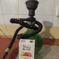 قلیان همراه با تنباکو دوسیب آلبالو