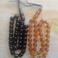 دو عدد تسبیح سندلوس آلمان . انگشتر .(معاوضه)