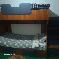 تخت دو طبقه چوبی