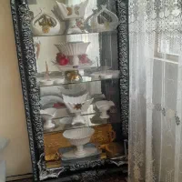 بوفه و ساعت ایستاده و آینه و کنسول