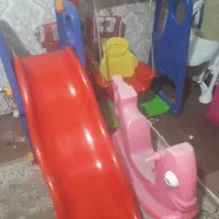 میز و صندلی ناهارخوری کودک تاپ و سرسره و الاکلنگ