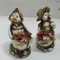 مجسمه  ، کوسن، لباس فرم، شکلات خوری