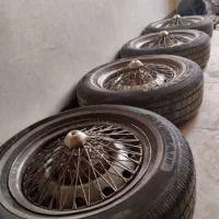 لاستیک دورسفید پیکان+ رینگ کالسکه ای