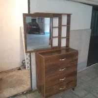 دراور بااینه