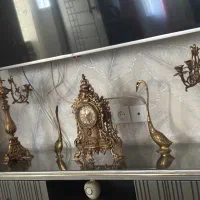 ساعت و شمعدان برنجی