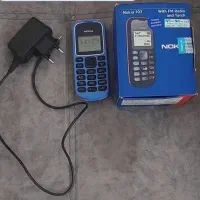 یک عدد گوشی نوکیا به همراه سیمکارت رُند ایرانسل