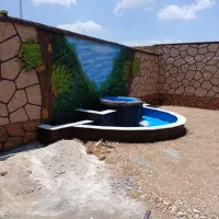 سیمانبری،حوض ابنما الاچیق نرده کبابپز،نما ساختمان