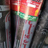 پخش( ایزوگام و قیر) از درب کارخانه .