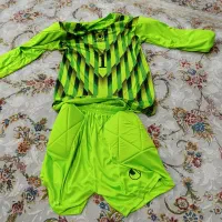 لباس گلری درجه یک مارک uhlsport سایز 12 سال