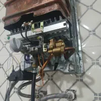 سرویس نصب تعمیرآبگرمکن تانکراب پمپ کولرلول کشی شیر