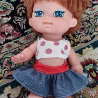 عروسک   اسباب  بازی