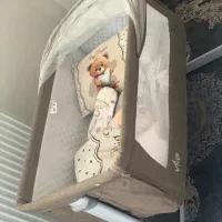 تخت کنار مادر تاشو