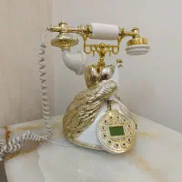 تلفن رومیزی کلاسیک سلطنتی سالم و نو طرح طاووس