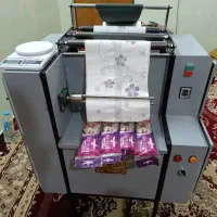 دستگاه رول کن سفره یکبار مصرف