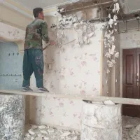 گچ کارگچکاری تخریب شومینه کناف کاشلکه گیری بازسازی