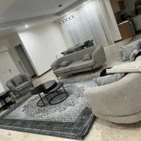 مبل راحتی همراه میز ناهارخوری و عسلی