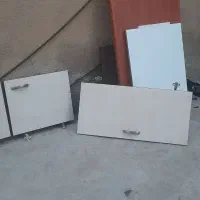 مقداری درب ولوازم کابینت .