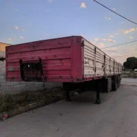 تریلر کفی بقل دار
