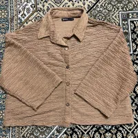 تعدادی مانتو و شلوار
