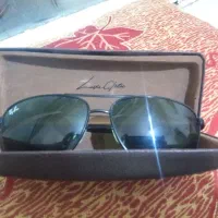 عینک افتابی یک دهم قیمت یامعاوضه با سگ پارمین