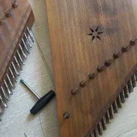تعمیر ساز سنتور و تنبک فلزی