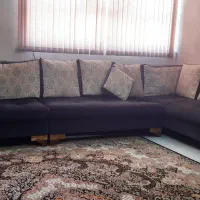 مبل ۹ نفره L شکل با دو عسلی و میز وسط