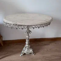 میز بیضی با صفحه سنگی