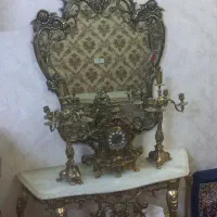 اینه و شمعدان وساعت