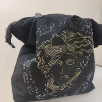 گمشده شدن کیف پول مشکی زنانه شامل مدارک